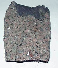 Ett litet foto av den magmatiska bergarten synenit.