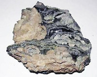 Ett litet foto av den magmatiska bergarten Ryolit.