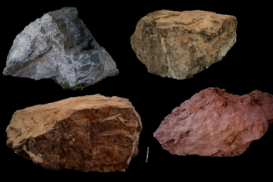 Fyra frilagda stenblock, grå och rödaktiga, varav några är granit och kalksten.